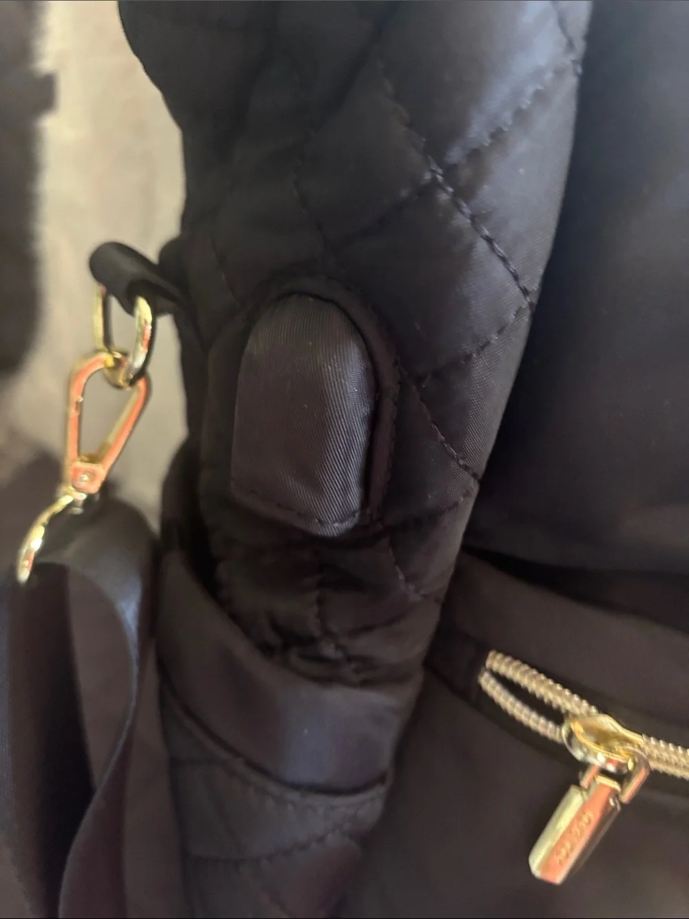 Stylish Quilted Black Backpack with Gold Hardware